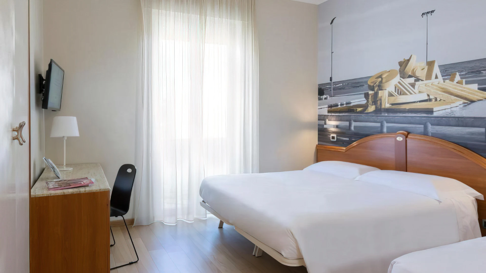 Dreibettzimmer mit Balkon