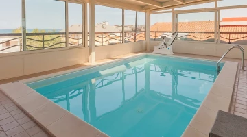 Piscina stagionale coperta