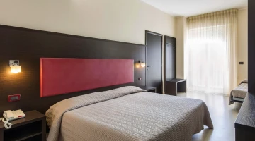 Chambre triple supérieure avec balcon