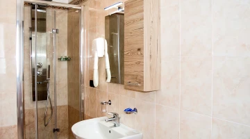 Private bathroom with shower cubicle