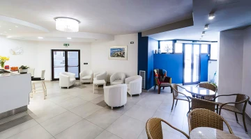 Common room with sofas and armchairs