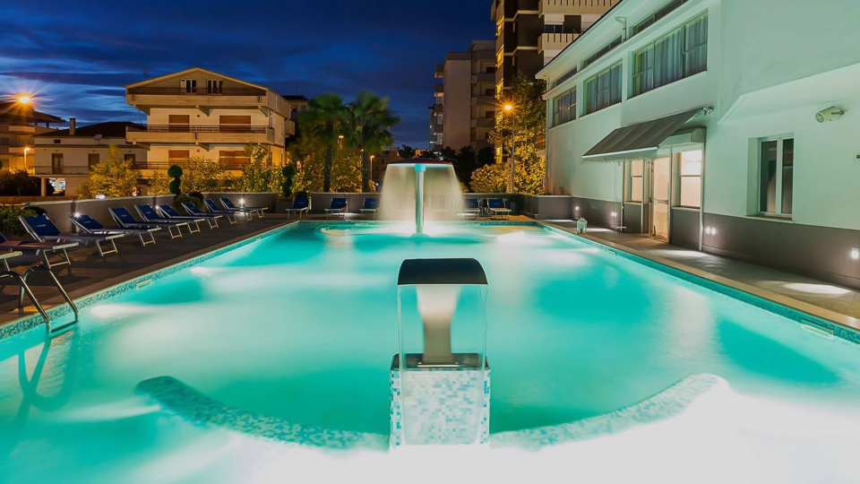 Swimming pool with waterfalls