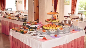 Buffet of side dishes and fruit