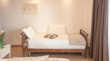 Einzelbett im Dreibettzimmer
