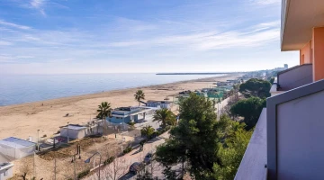View of the beach from a balcony