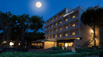 External facade of the hotel at night