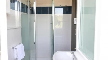 Private bathroom with shower box