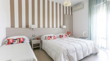 Triple room with private balcony