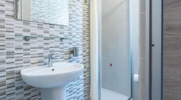 Private bathroom with shower cubicle