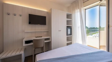 Room with TV, minibar and private balcony