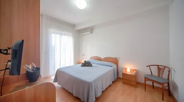 Double room with TV and private balcony