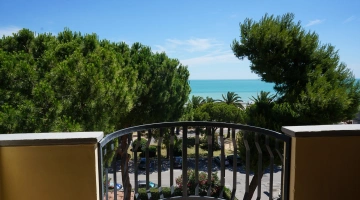 Room with balcony and sea view