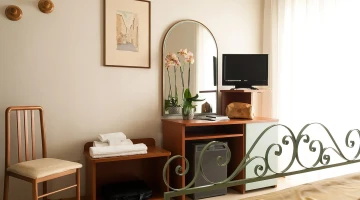 Room with a TV and desk
