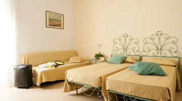 Single beds and sofa bed in the Family room