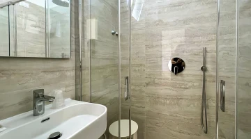 Private bathroom with shower cubicle