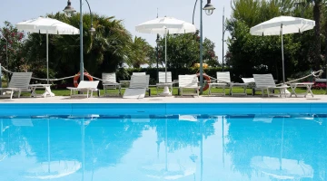Swimming pool with solarium area