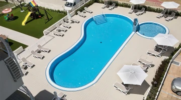Swimming pool with children&#39;s pool