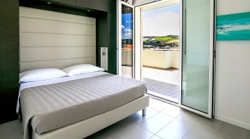 Double bedroom in apartment with terrace