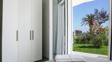 Double bedroom with linen supplied in a two-room apartment