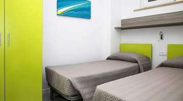 Double room with single beds in the apartment
