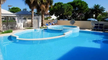 Swimming pool with shallow water area for children