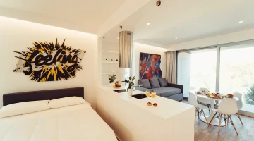 Suite Deluxe avec lit double et coin salon