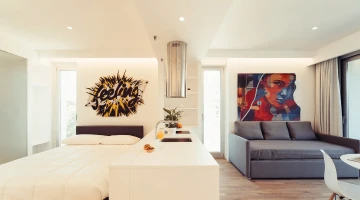 Suite Deluxe avec lit, kitchenette et canapé-lit