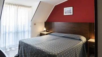 Chambre double mansardée avec balcon