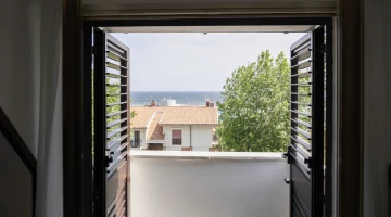 Chambre double avec balcon donnant sur la mer
