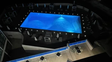 Swimming pool in the evening from above