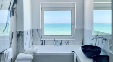 Services with window overlooking the sea