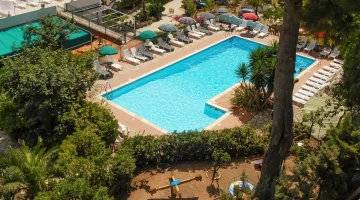 Garden with playground and swimming pool
