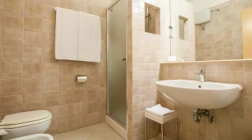Private bathroom with shower cubicle