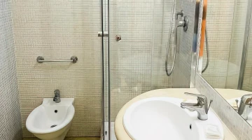 Private bathroom with shower cubicle