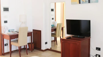 TV and desk in the room