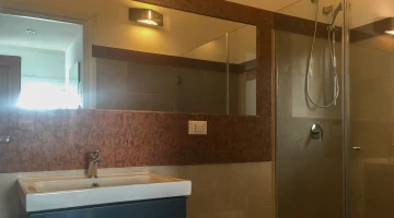 Private bathroom with shower cubicle
