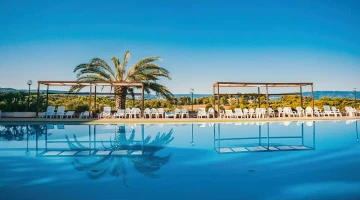 Swimming pool with relaxation areas