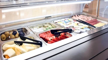 Breakfast buffet with fruit and savory products