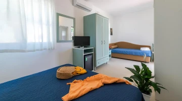 Furnishing detail in triple room