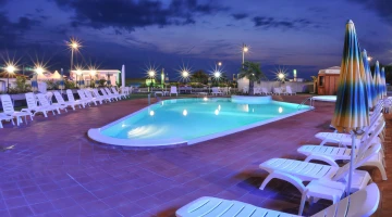 Swimming pool with evening lighting