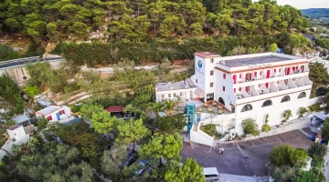 Hotel surrounded by greenery