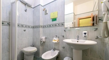 Private bathroom with shower cubicle