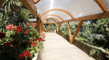 Covered corridor in the garden