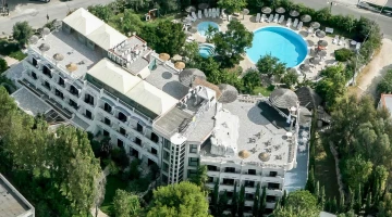 Aerial view of the structure with garden and swimming pool