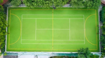 Multipurpose sports field for five-a-side football and tennis