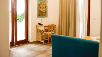 Family Room with desk and private balcony
