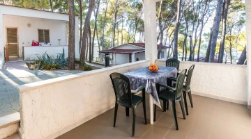 Small balcony with table and chairs