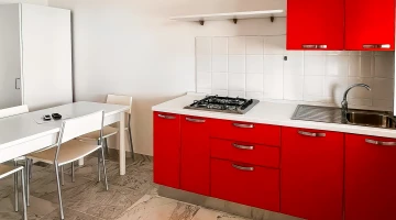 Kitchen and table of an apartment