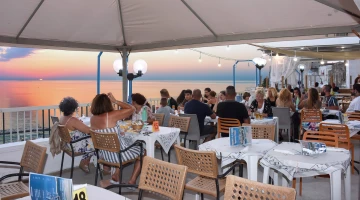 Restaurant in the building with terrace overlooking the sea