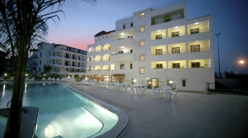 Swimming pool illuminated in the evening